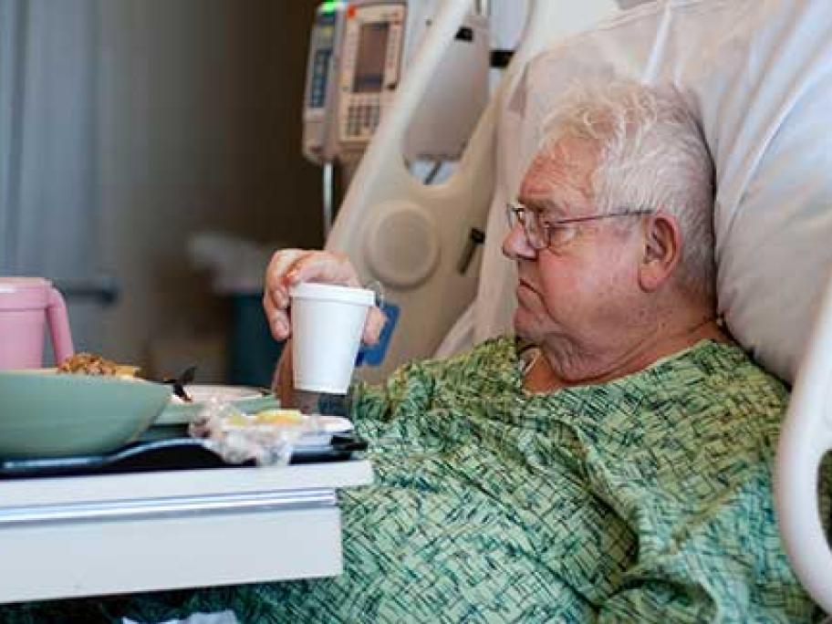 older patient in hospital bed